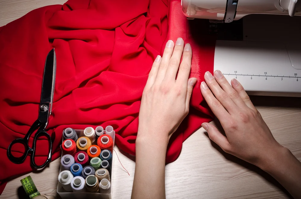 woman sewing clothes